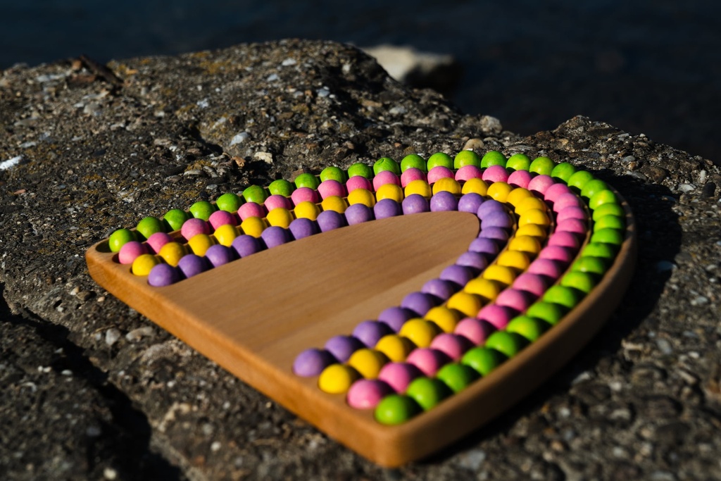 Arc-en-ciel sensoriel avec boules en bois