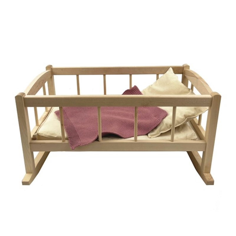 Berceau en bois avec couverture en tricot