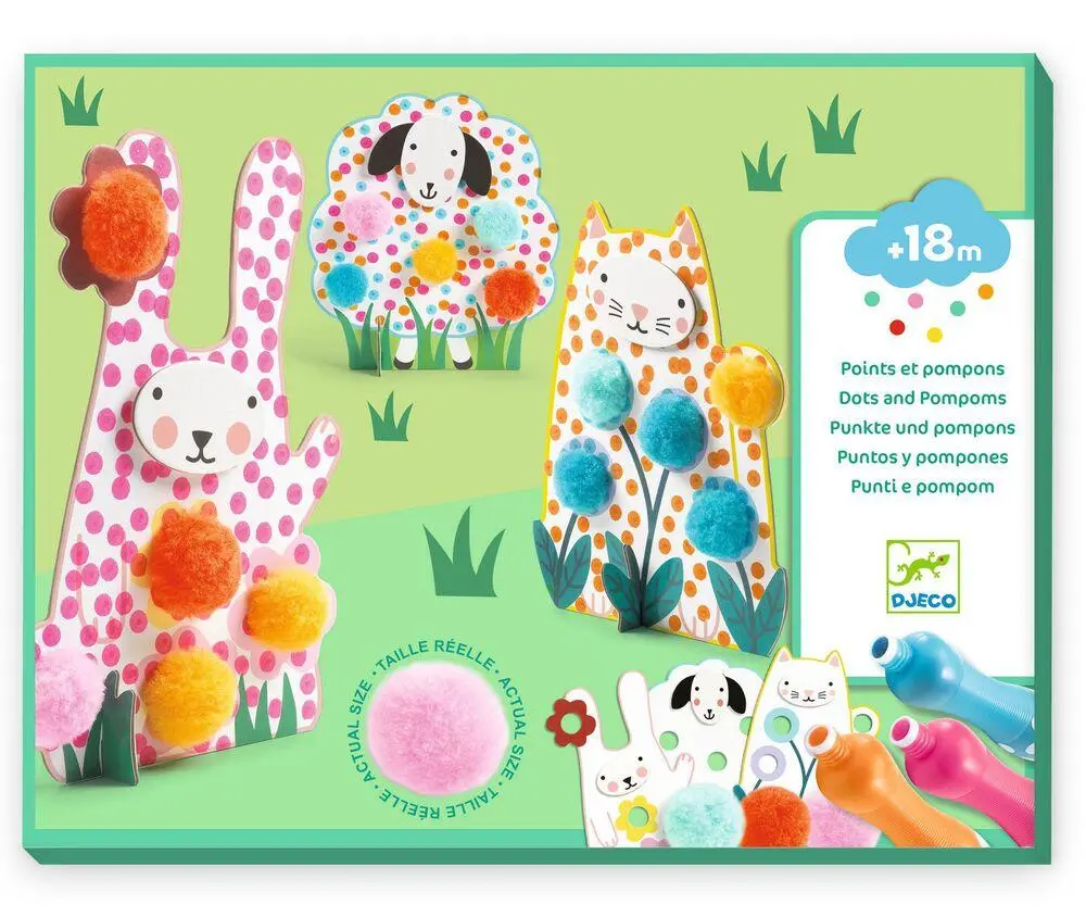 Des Points et des pompons Dans l'herbe